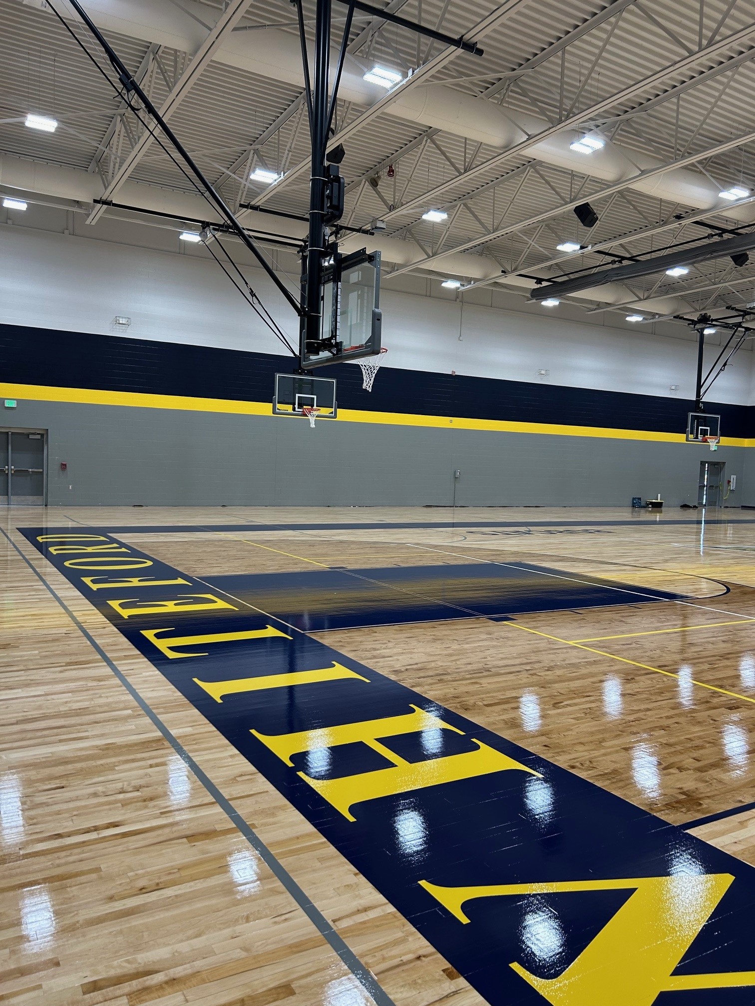 Ceiling-mounted basketball backstops — Whiteford High School